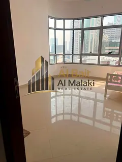 Spacious 2-Bedroom Apartment for Annual Rent in Al Taawun Directly at the Dubai Exit, Featuring a Be
