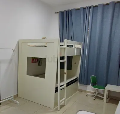 White wooden bunk bed with two very good matress— good condition