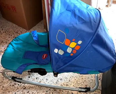 Baby bouncer/rocker with canopy - gently used