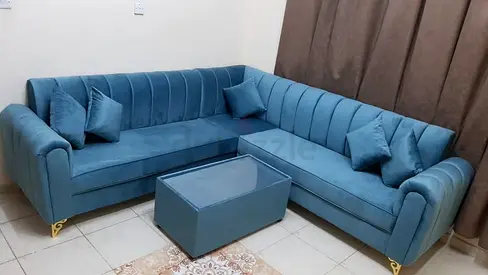 Blue L-shaped Velvet Sofa with Matching Ottoman — Good quality