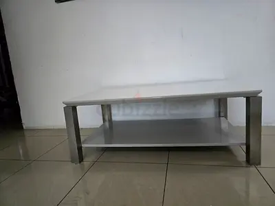 Low white coffee table with lower shelf and metal legs - Home center