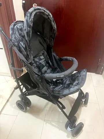 Lightweight gray baby stroller in good condition