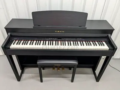 Yamaha Clavinova CLP470 piano with bench. Perfect working. Cash on delivery with six months warranty