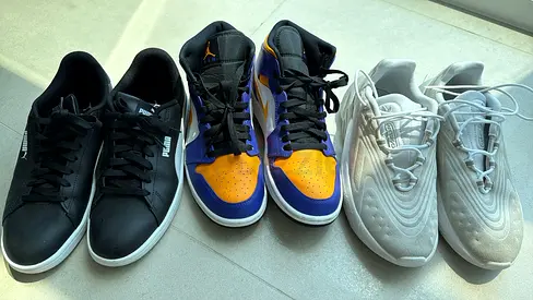 Three pairs of casual sneakers - various sizes (used)