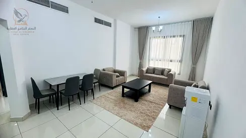 Furnished two-bedroom apartment with a living room, first occupancy, for monthly rent in Al Rashidi