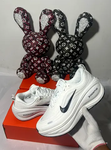 Nike Vomero Plus white shoes unisex