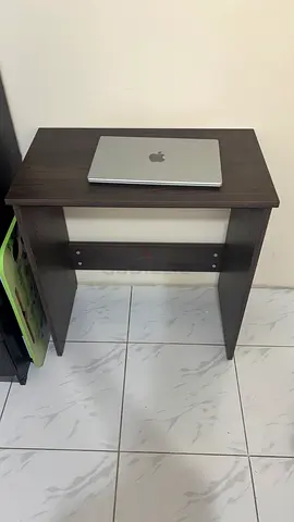 Compact dark wood study/computer table - good condition.