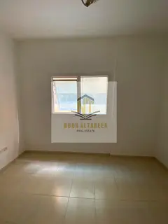A wonderful apartment for rent in Al-Taawun, featuring a bedroom, a living room, a kitchen, and two