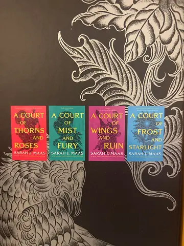 A Court of Thorns and Roses series by Sarah J. Maas - 4 paperback books