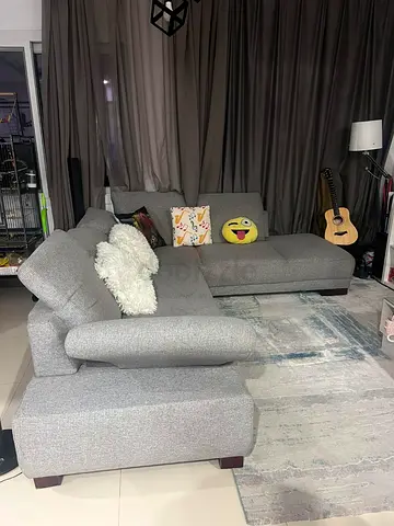 L-shaped grey fabric sectional sofa - modern, comfortable