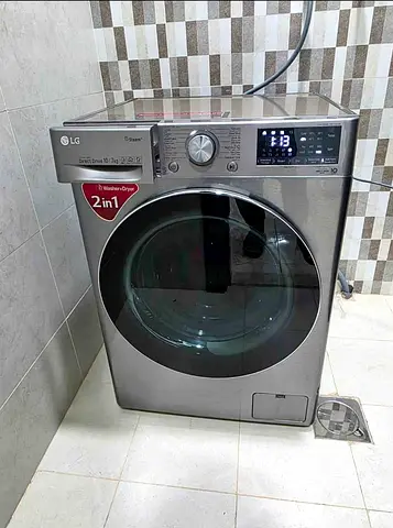 LG 2-in-1 Front Load Washer Dryer 10/7 kg - Silver, Good Condition