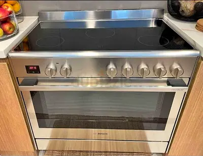 Bosch stainless steel electric range with ceramic hob and oven - good condition