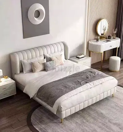Modern upholstered king bed with padded headboard in white