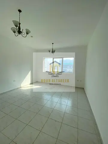 Room and living room for rent in Al-Taawun.