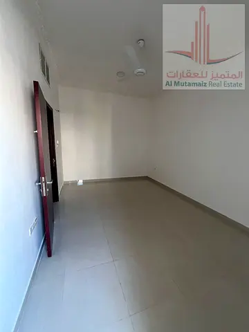 One-bedroom apartment with a living room and two bathrooms in Al Rawda 3 area, very prime location, family-only building
