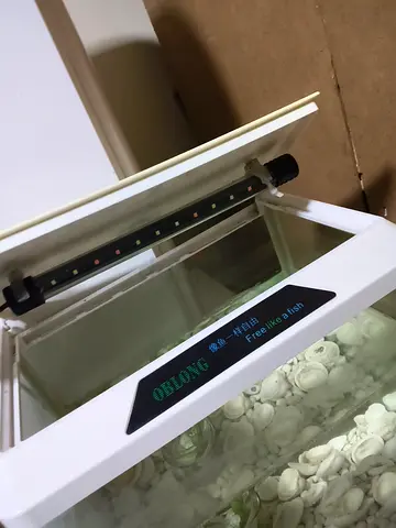 Small white tabletop aquarium with LED light - good condition