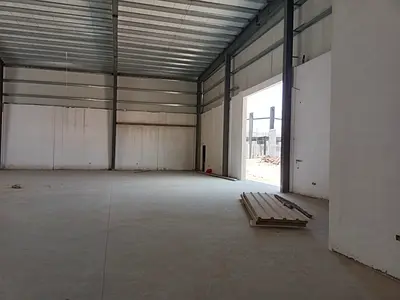 Industrial Sheds for Sale on Main Road | 10,000 Sq. Ft. | 120 KW Power | Strong Investment Opportunity | 20-Year Term