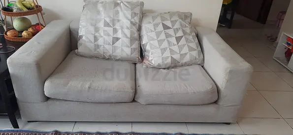 2-seater beige fabric sofa - good condition, sturdy frame