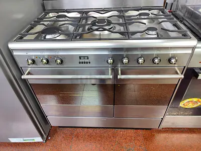 Smeg latest model 5 burner gass/electric dual oven full heavy duety 90x60 stove hew