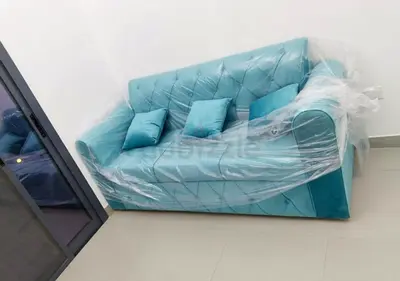 Light teal 3-seater tufted sofa (like new) with cushions