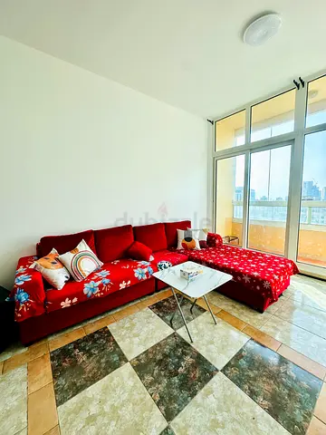 Red L-shaped Sofa with Chaise Longue – Good Condition
