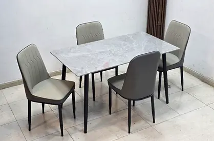 Brand New Stylish Diding table with 4 chair Available