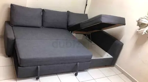 Grey fabric storage sofa bed - good condition