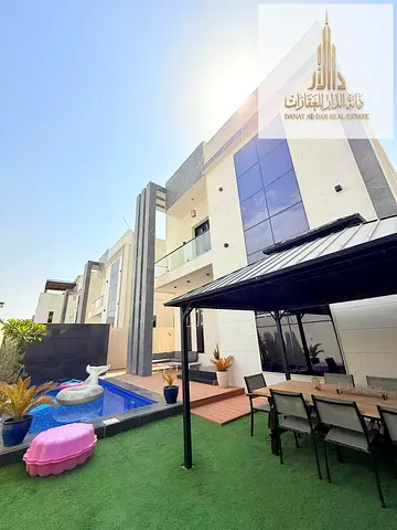 For rent: 4-bedroom furnished villa with a majlis and living room, with a swimming pool and gym in Al Bahia, Ajman.
