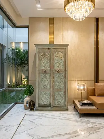 Antique Distressed Teal Accent Wardrobe with Floral Relief Panels