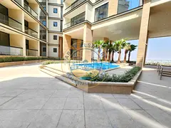 Spacious 2bhk with balcony wardrobe 3 washrooms Open view with pool Tilal City Sharjah