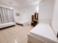 Big Room with attached balcony, one minute walk from Al Rigga Metro station.