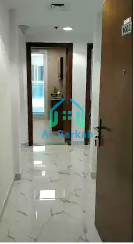 **Spacious 3-Bedroom Apartment with Living Room in Al Waha Towers – Ideal for Living and Investment**