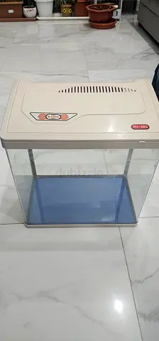 Used glass aquarium tank with plastic hood/filter unit - good condition