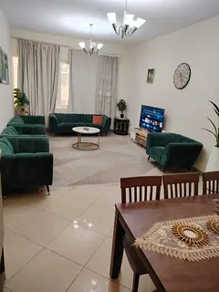 Two-bedroom apartment with hotel-style furnishings for monthly rent in Al Majaz 3, Al Qasba, Sharjah