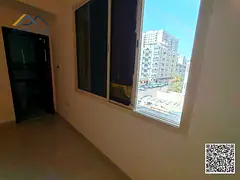 A prime residential opportunity for rent on a main street in Al Rashidiya 3. A studio apartment is a