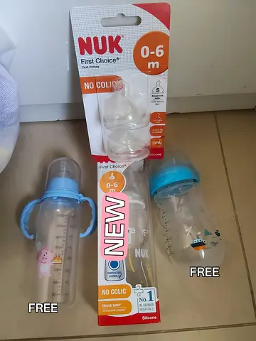 NEW NUK baby bottle set with extra feeding bottles — 0-6 months