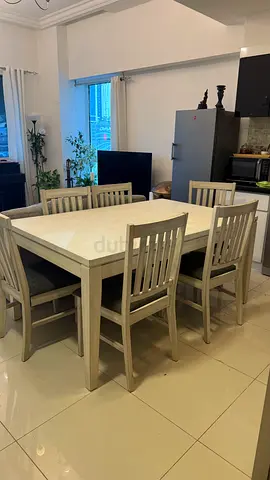 Solid wood 6-seater dining table set - light finish, good condition