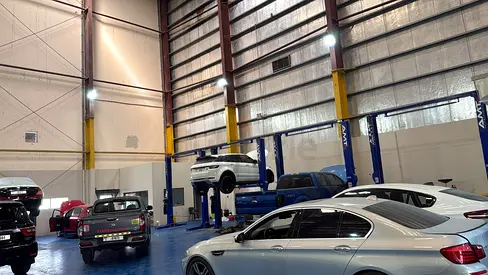 Car Workshop with Multiple Vehicle Lifts and Equipment - Fully Operational Garage