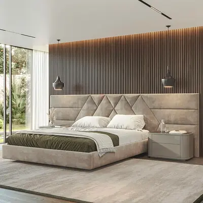 Modern upholstered king-size bed with padded headboard