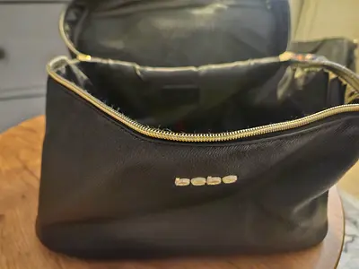 Black bebe leather makeup / toiletry bag with gold zipper