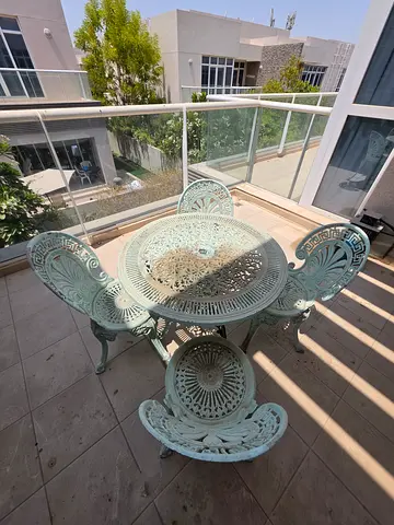 Vintage cast-iron outdoor table and 4 chairs set - mint green