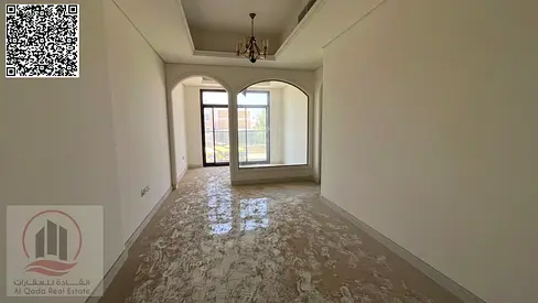 A distinctive two-bedroom apartment with a living room is available for rent in Ajman's Al Tallah area
