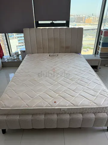 Queen upholstered bed frame with mattress - light beige, good condition