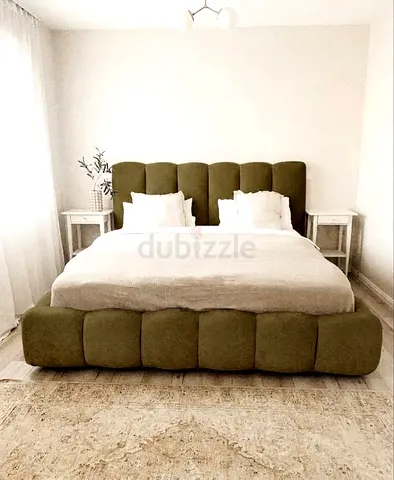Plush Olive Green Upholstered King Bed with Padded Headboard