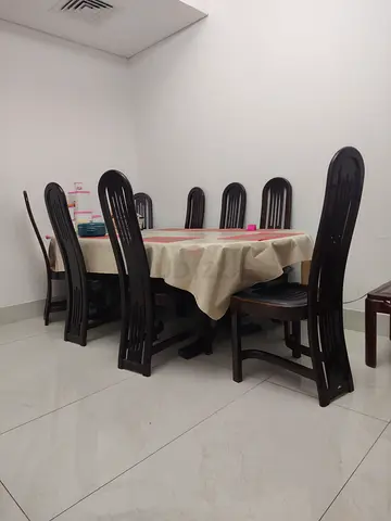 8 seater dinning table with chairs