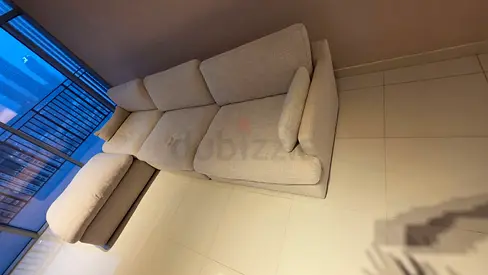 Great Condition Home Center swin sofa with footstool