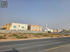 Corner plot for sale on a main street, 10,000 sq ft, directly opposite the mosque. Residential/comme
