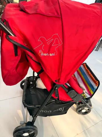 Red lightweight foldable baby stroller — used, good condition