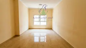 2BR apartment for lease in Al Majaz 2, Sharjah, with three bathrooms and built-in wardrobes. Practic