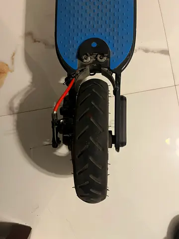 Used electric scooter rear wheel and deck - Spares or repairs. Only power up when charging.